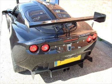 McBeath designed S2 Exige adjustable tailgate mounted with 1245mm wide (width complies with Lotus On Track regulations). Available in straight or curved plan view guise.