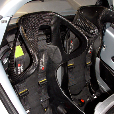 Mulsanne XRC - the ultimate fully-focussed track day Lotus seat [UK drivers side] and Mulsanne C with optional bolt-on headrest passenger side in Elise S1 - both with Reverie Carbon effect leather embossed seat cushion kits