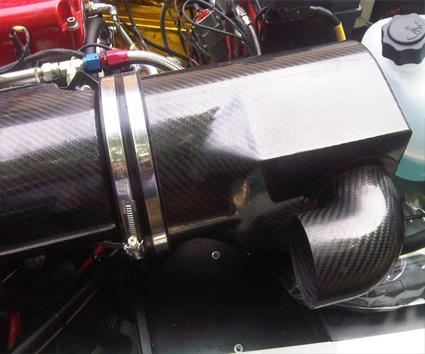 Zolder 112 RH entry with 100mm alloy stepped filter adapter bonded in end and indy 200 FC with 90’ 45’ 75mm snorkel and 75mm naca duct in nose for cold ram air 